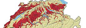 Karte der Landschaftsökologie mit roten Flächen, die ökologische Zonen in der Schweiz darstellen, inklusive Seen und Flüsse